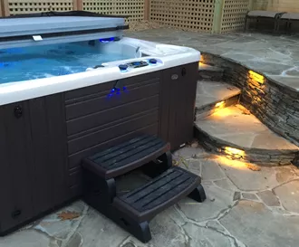 Flagstone patio with Hot tub.