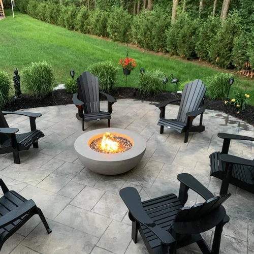 Patio With Stone Pavers With A Fireplace