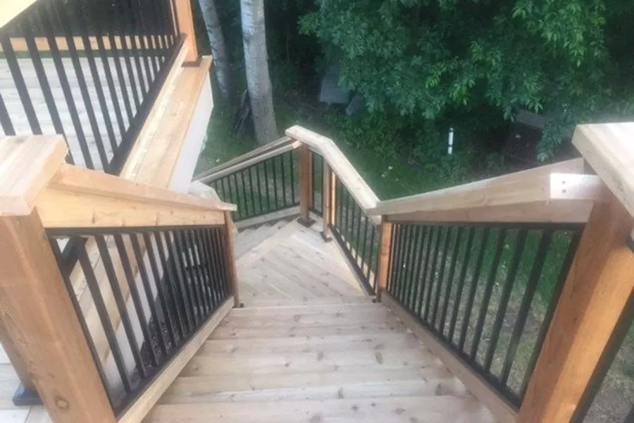 Cedar deck with aluminum baluster railings.