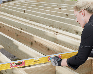 Deck Framing with Joists and Beams Under Construction