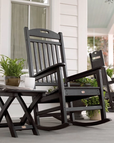 Black Trex Outdoor Rocking Chair on a porch