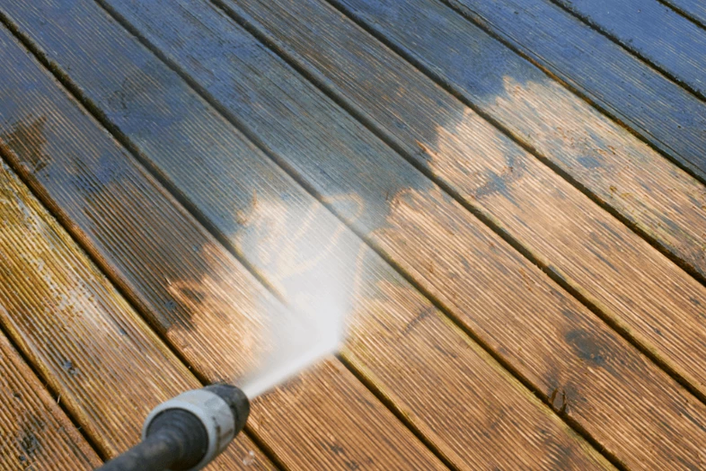 Using a pressure washer on a deck can drastically improve the appearance of a deck