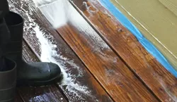 Cleaning a deck.