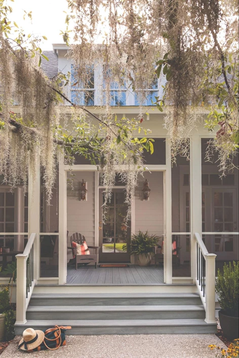 Patio with gray decking and white railing