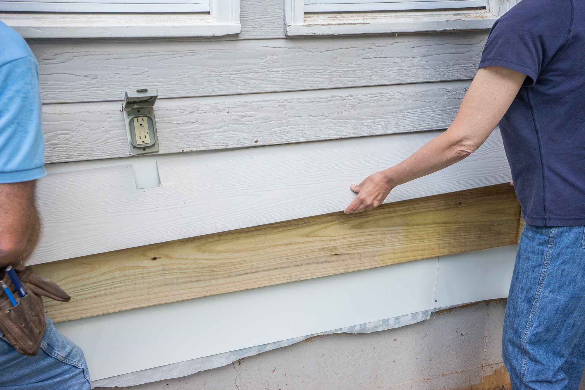 Carefully slip in the siding