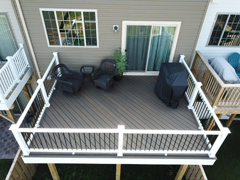 Deck with white Trex railing and black balusters