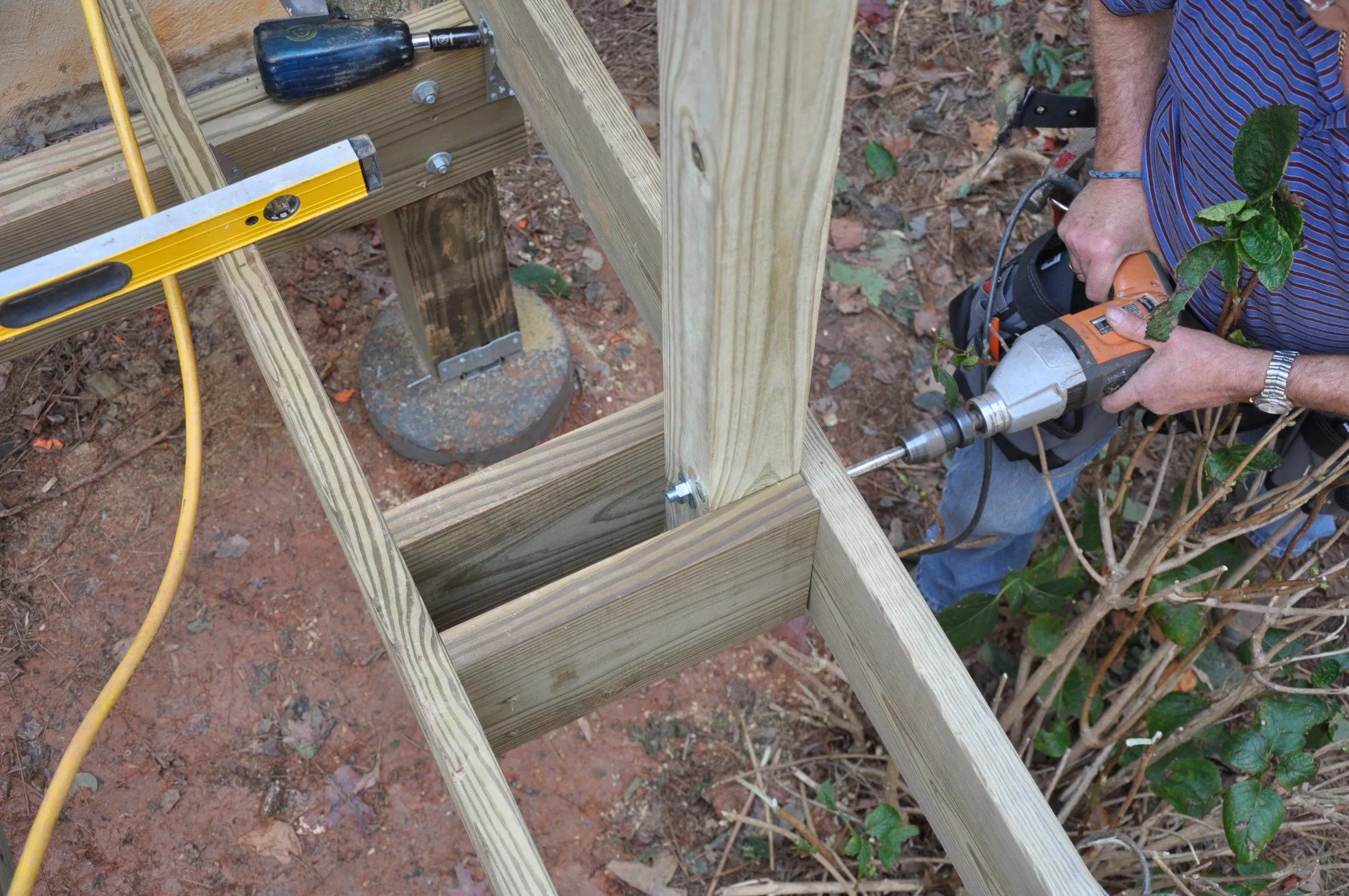 How To Attach 4x4 Post To Deck For Railing How to Install Deck Railing Posts | Decks.com
