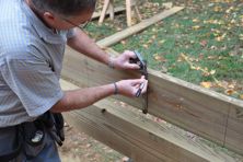 Use a sharpie or construction pencil to mark your joists.