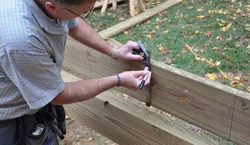 Use a sharpie or construction pencil to mark your joists.