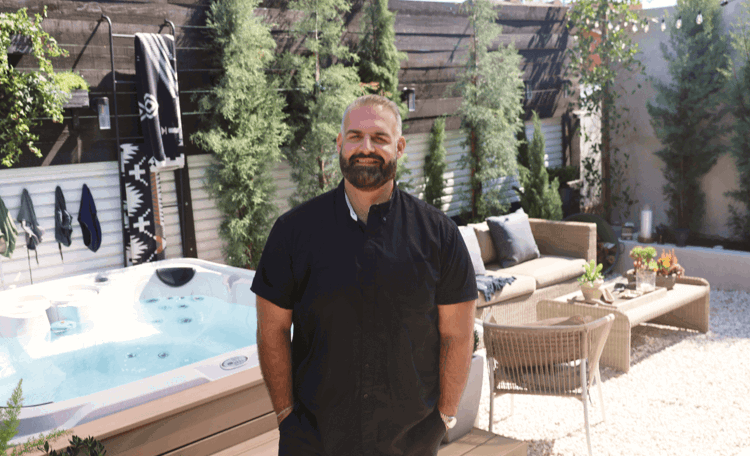 James DeSantis Standing In A Backyard He Designed