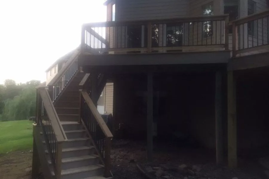 Cedar deck with aluminum baluster railings.
