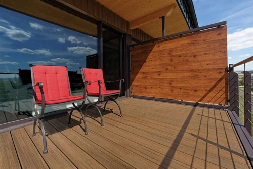 Apartment Patio With Dark Deck Boards Patio Chairs And Privacy Wall For Balcony Privacy