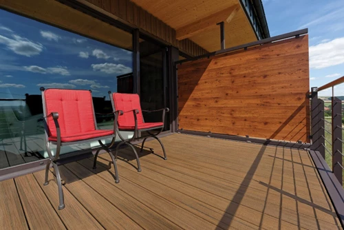 Apartment Patio With Dark Deck Boards Patio Chairs And Privacy Wall For Balcony Privacy