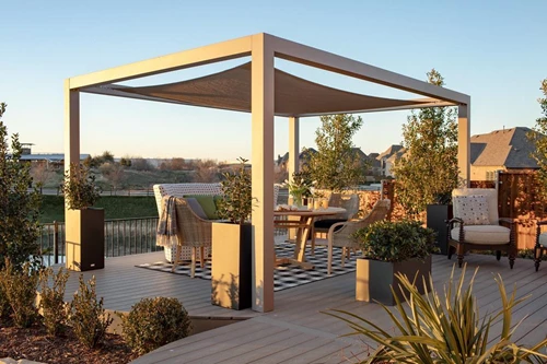 A patio using a pergola for privacy