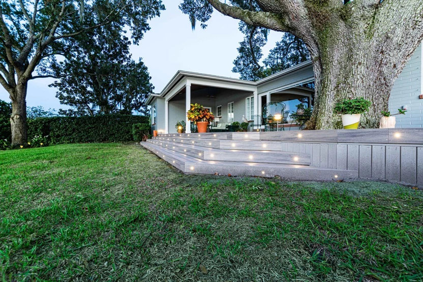 Recessed lights inside the stairs of the patio and along the edges