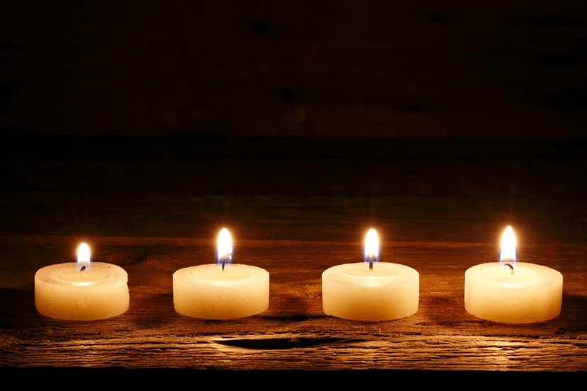 4 lit candles