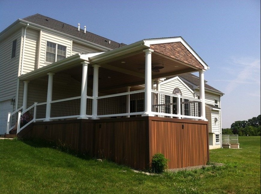 Building A Roof Over Your Deck Decks Com - How To Build A Patio Porch Roof