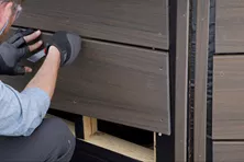 Person Installing Deck Skirting