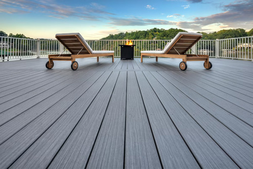 Deck With Lounge Chanres And A Fire Table