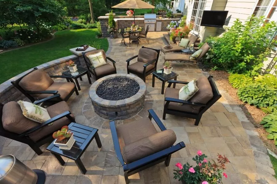 Patio With Stone And Chairs And Fireplace