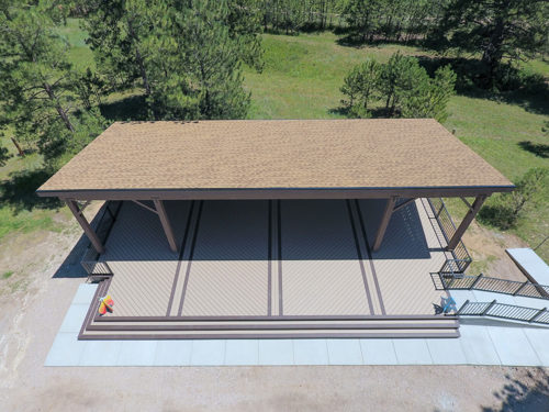 Two toned deck with gray and brown deck and railing.