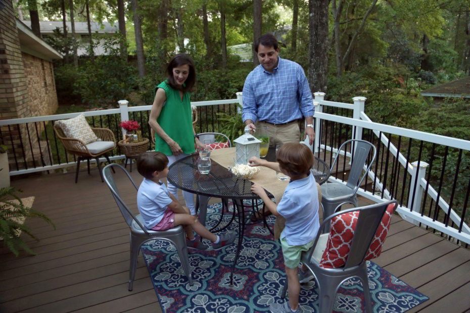 Family enjoying back deck