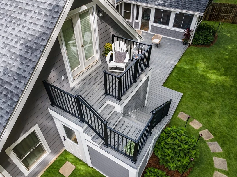 2nd level with a metal railing and a stone walkway